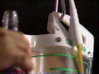 Asian Woman's Anal Training with Enemas